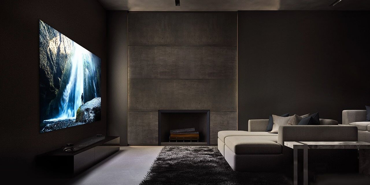 Custom home theater living room with large display and integrated audio